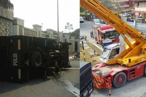 載有23名被捕男女，警用羅裡上坡路翻覆！幸無人趁機逃走！