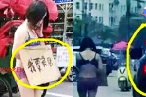 女子僅穿內衣褲在街頭舉牌,看到牌子上4個大字,網友:現代版「賣身葬父」?