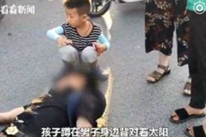 騎士車禍倒地7歲童蹲地為他擋太陽