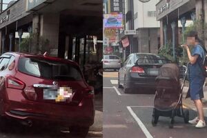 找停車位時發現女子用嬰兒車和人體佔位，車子靠近時女子用手勢表示不能停。社員表示:違規還有理趕人?