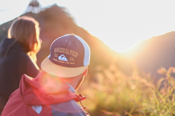 persons-couple-outdoor-hiking-looking-sun.jpg