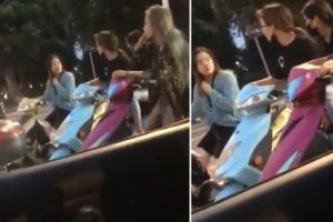等紅燈…女騎士沒戴安全帽好危險！看了下面「才是大亮點」