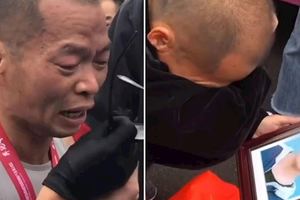 兒在賽前亡！他握遺照跑全馬衝線爆哭：爸爸做到了