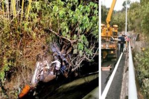 轎車過彎撞山壁墜橋妻死夫昏迷