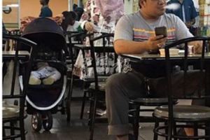 嬰兒在旁大叔照抽煙民眾好言相勸被丟煙頭