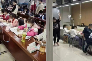 中國學童「吊點滴寫作業」　醫院恐怖景象曝…網心疼：父母病得嚴重