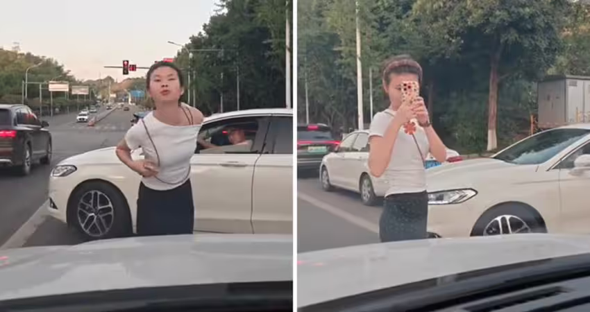 女子吐口水挑釁　肉身擋車流插隊