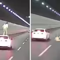 女子爬到車頂　行駛途中突然跳下