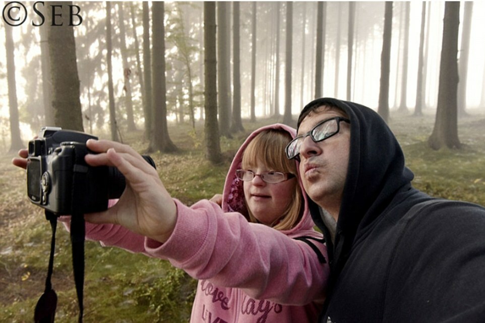 Mr Luczywo stretched out his camera arm to capture a selfie moment with his daugher