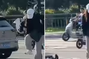 摔車沒動靜！她當街猛踹男子頭部　路人全無視