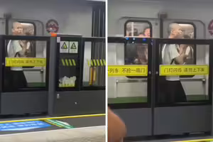 想衝進地鐵車廂 男子活活困夾縫 想衝進地鐵車廂 男子活活困夾縫